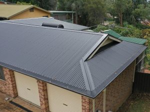 Newly installed grey metal roof showing durability and enhancing metal roof lifespan with proper maintenance.