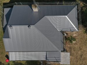 Aerial view of a Colorbond metal roof with installed vents for proper ventilation and airflow.